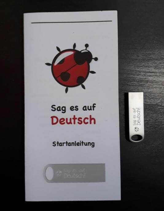 Sag es auf Deutsch Lieferumfang Bedienungsanleitung und USB-Stick